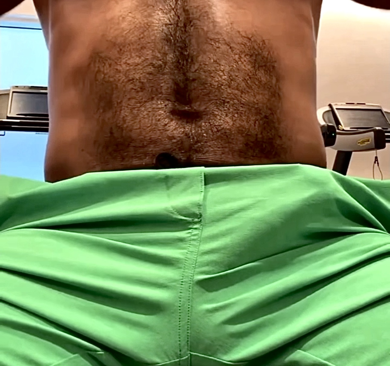 Hairy guy gets hard working out, jerks off in the sauna