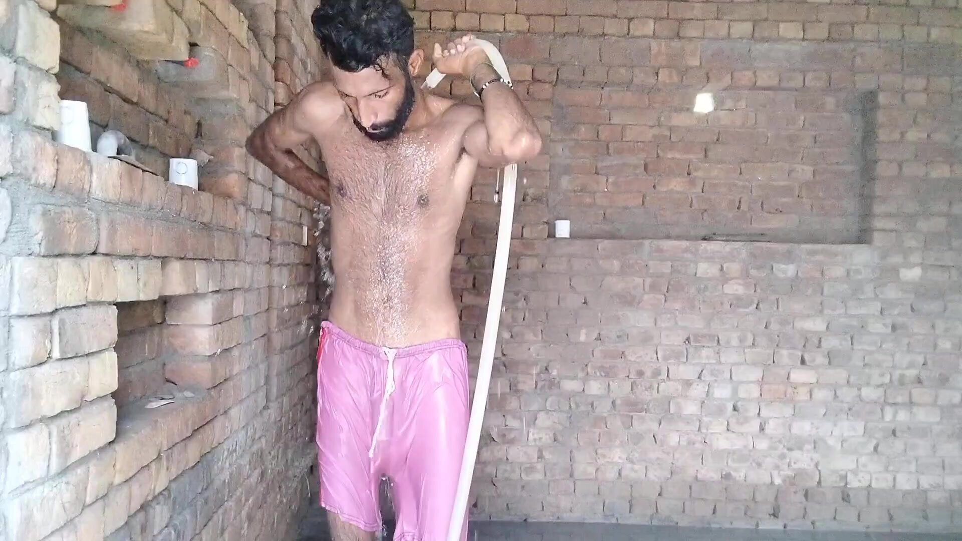 Pakistani guy bathing with semi