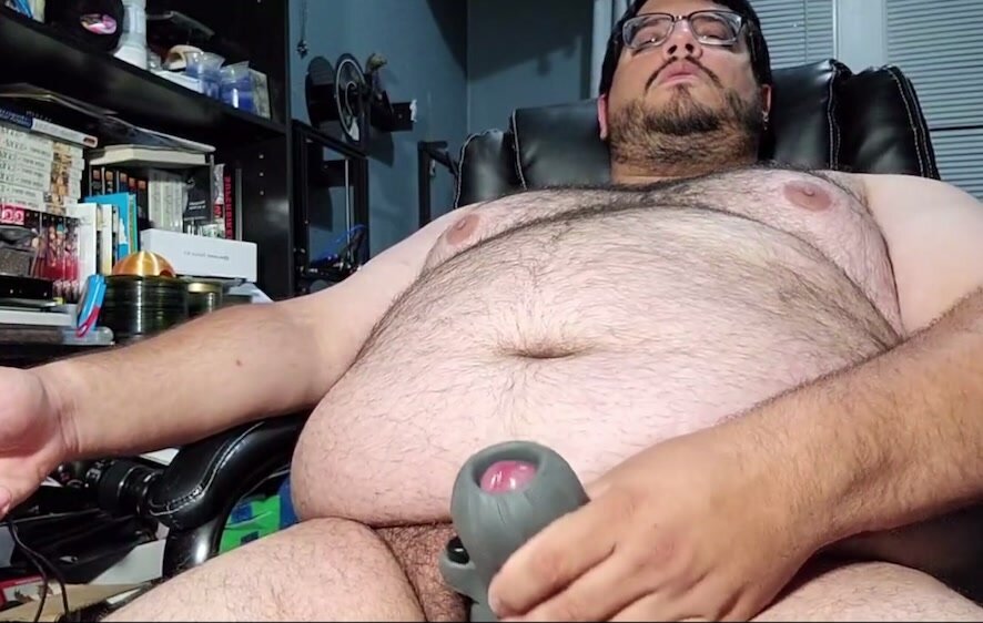 Bear using toy