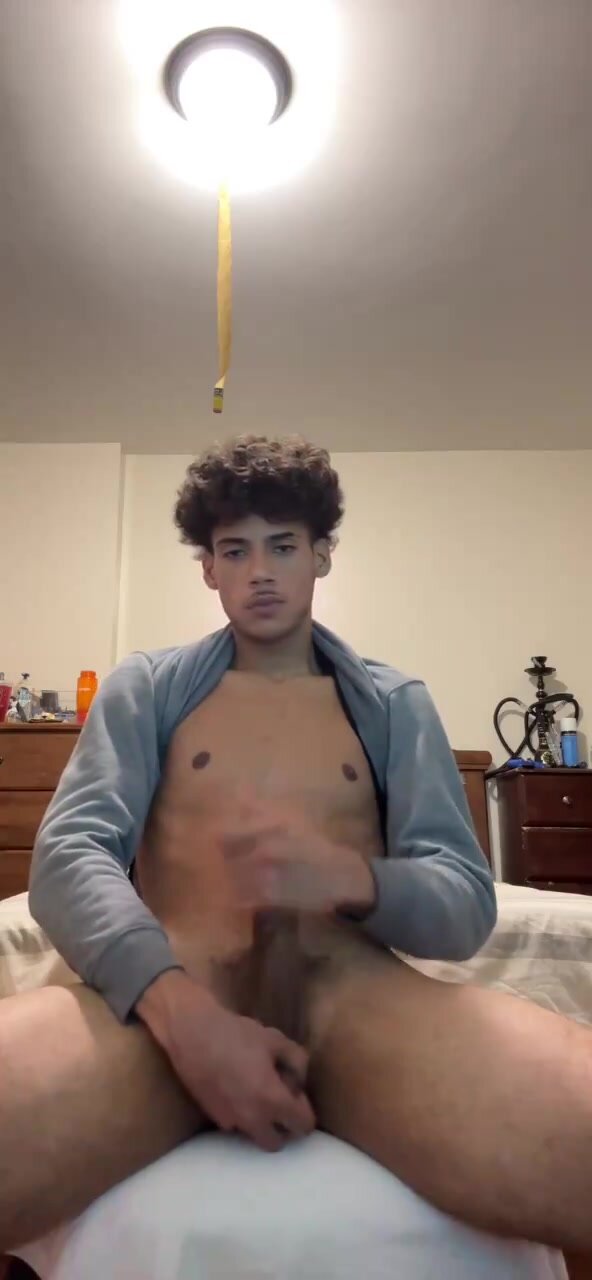 bust while looking in camera