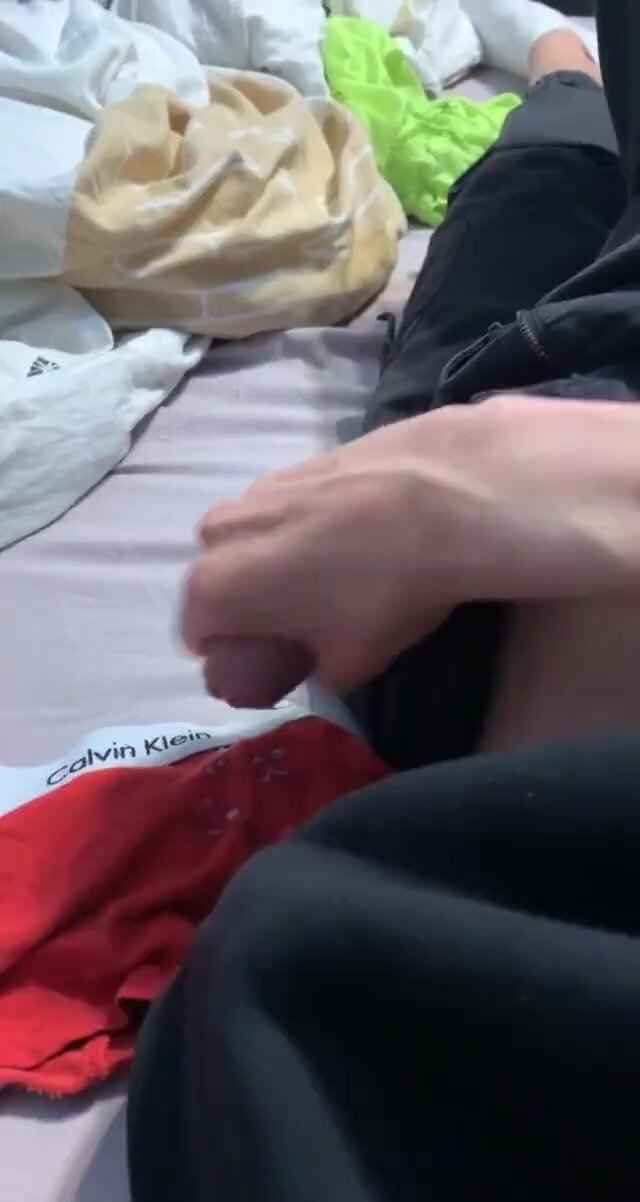 Hung uncut boy cums on his shorts