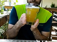 Amputee hands man drinks beer