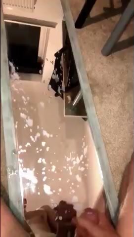 Huge cum blast on the mirror