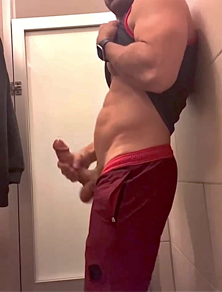 Huge cock athlete cums in gym locker room stall