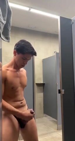 stud jerks in public bathroom