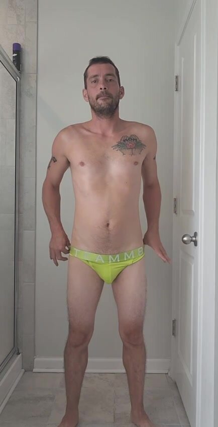 Slutty faggot strips down and shows his ass