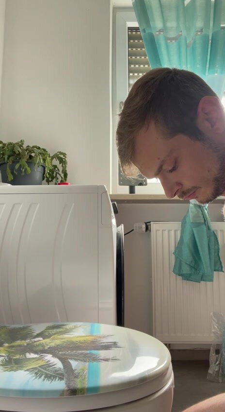 Horny faggot jerks his cock on the toilet