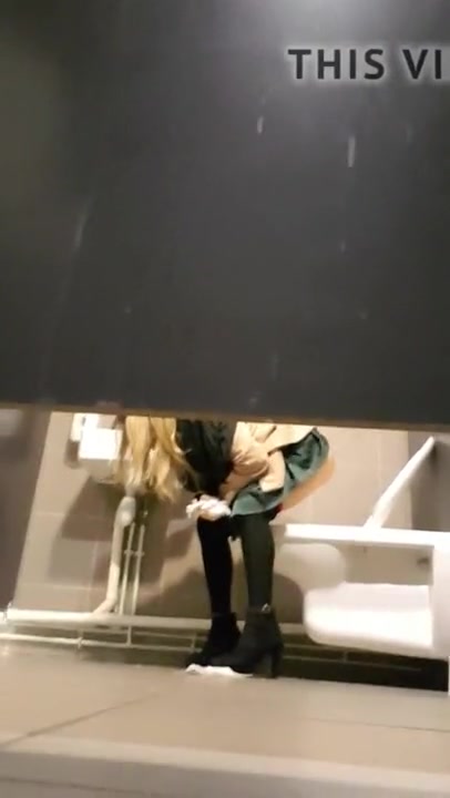 Spying blonde on toilet