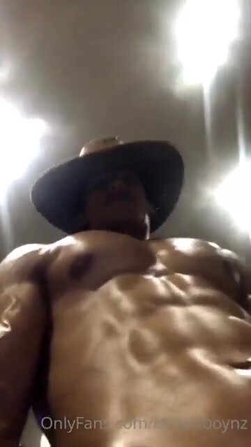 Brown boy shows off  his oiled muscle body