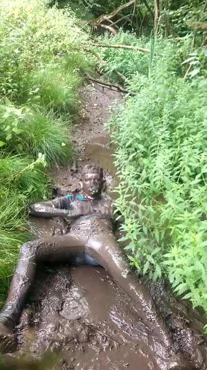 jumping in the mud in skinny jeans