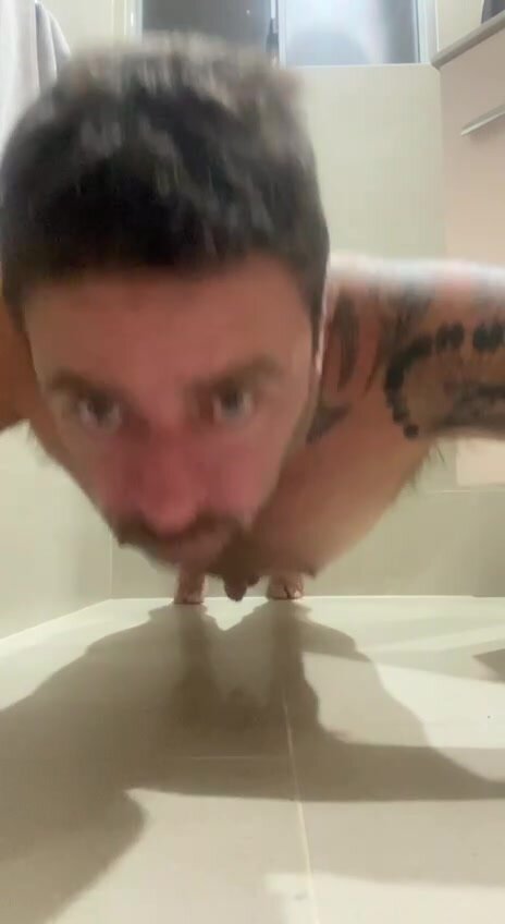 Faggot does a push-up and jerks off