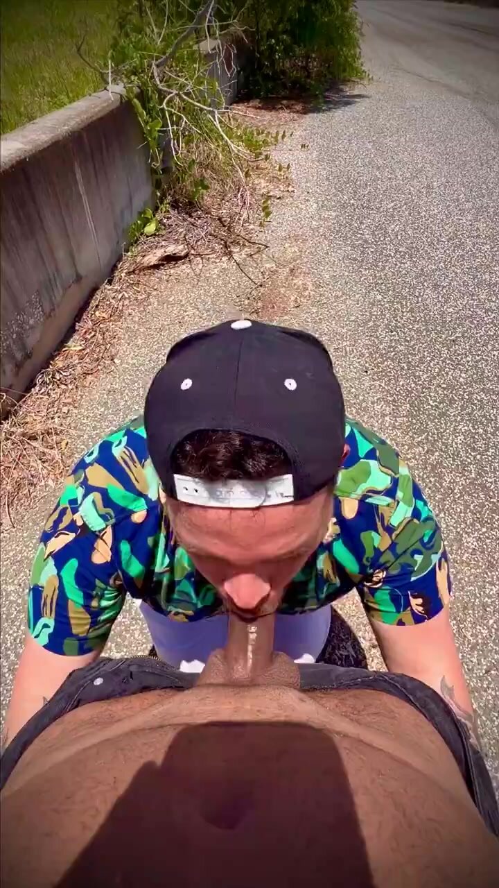 Black cock sucked outdoor