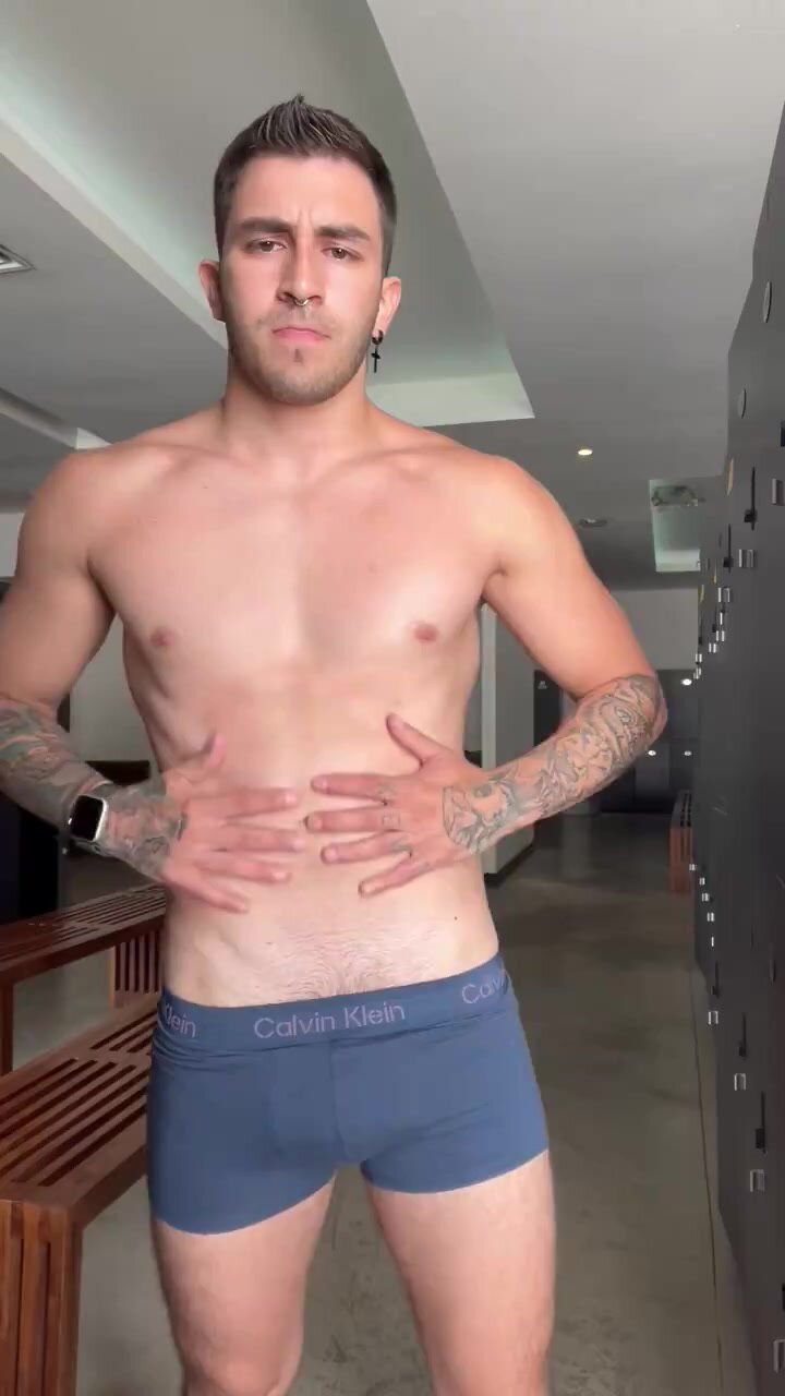 Handsome young man sniffing his underwear 2
