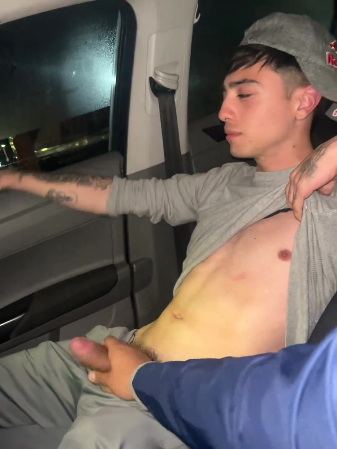 Cute guy gets his dick touched by man in car