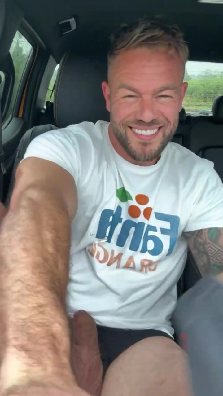 Handsome man showing everything in the car