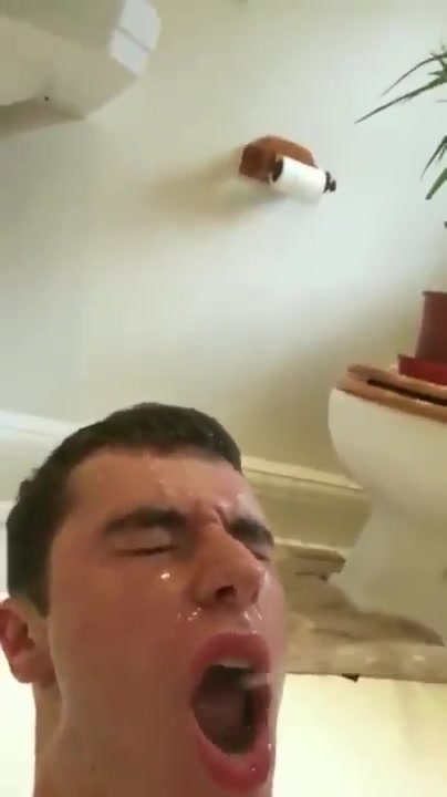 Pissing in his mouth - video 2