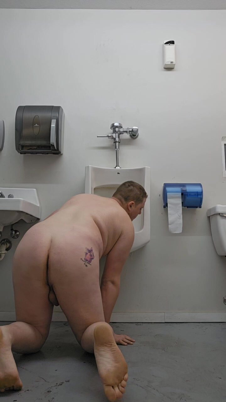 Horny fag piglet licks a urinal