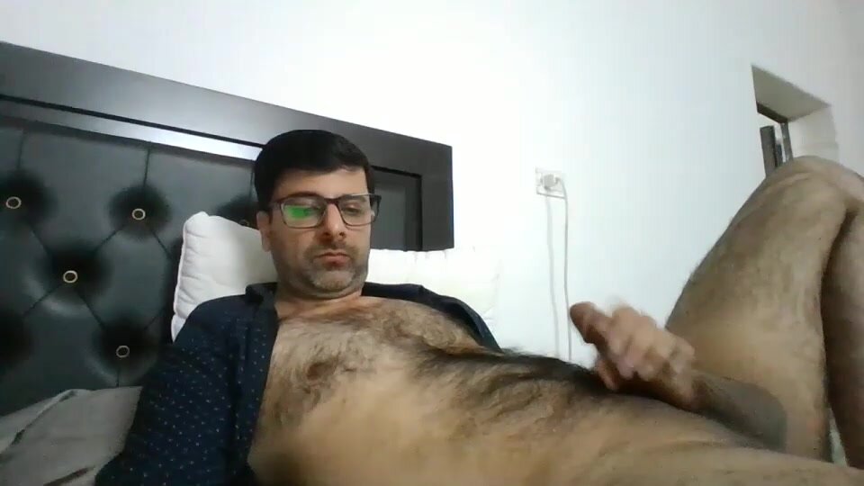 Hairy hot desi guy shoots big load on belly
