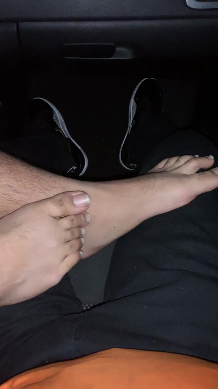 Straight friend rubs his feet