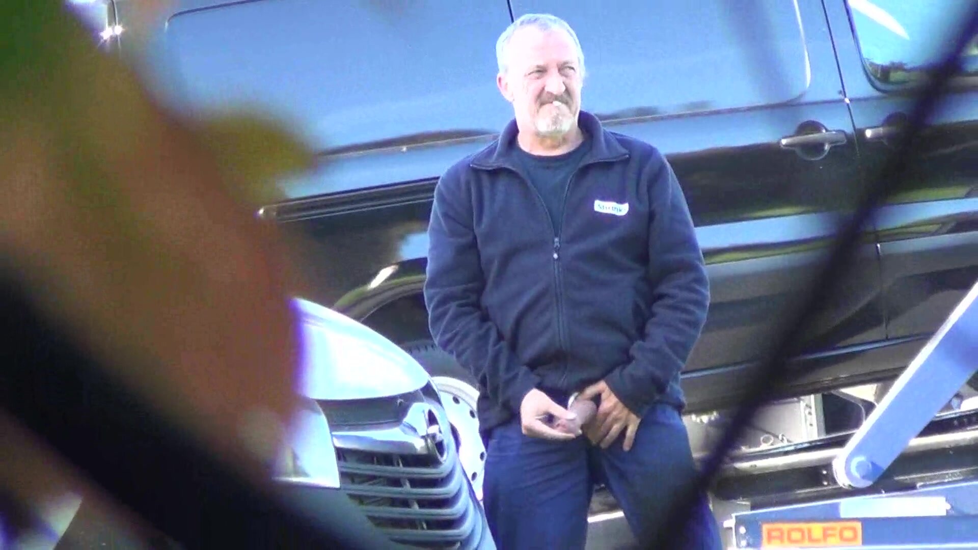 Truck driver exposes huge dick