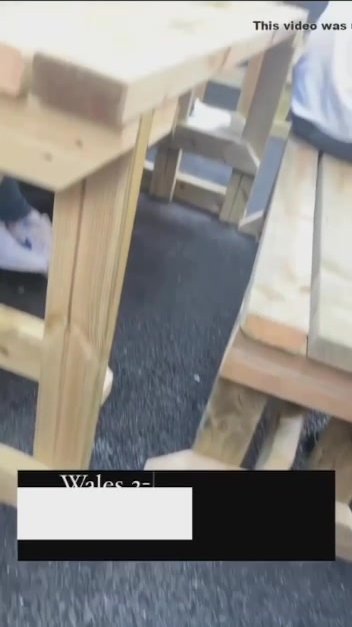 Drunken guy strips in a restaurant with friends