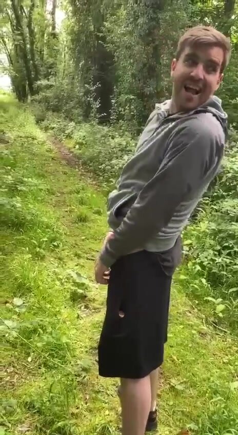 Cute guy peeing with his pink uncut dick