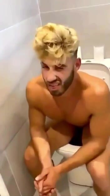 big cock guy peeing seated