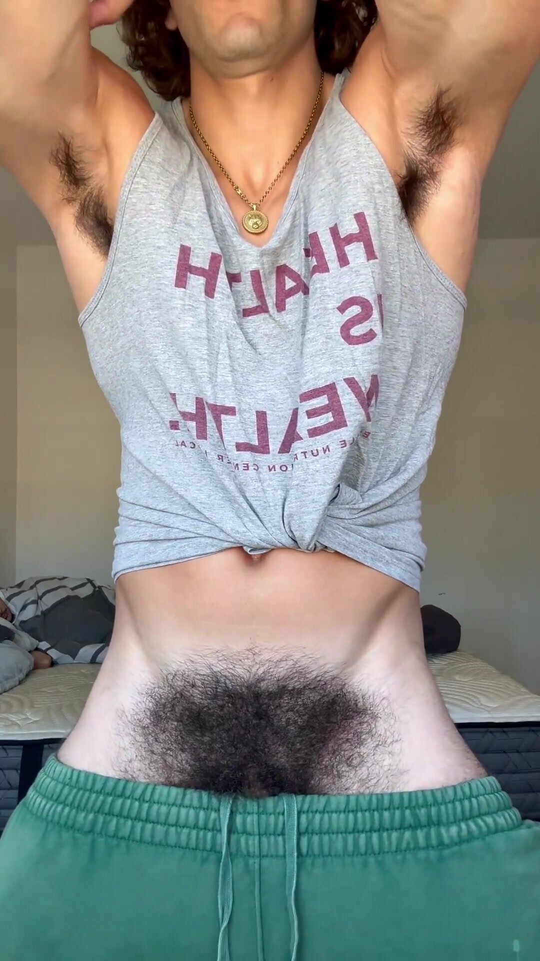 teasing his dark hairy pits and pubes (no nude)