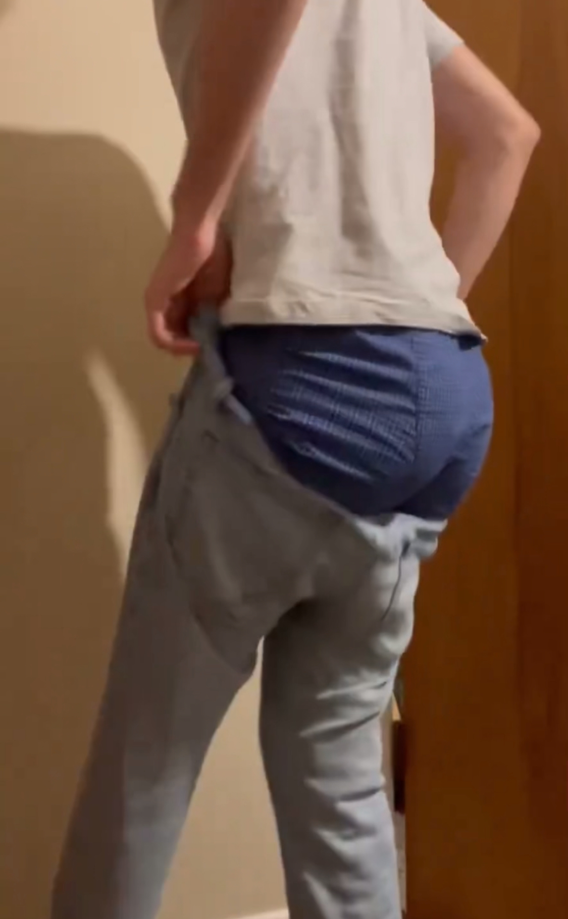 Putting on jeans