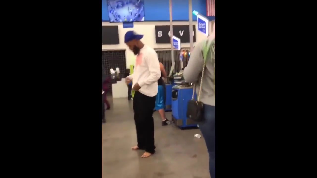 Dude strips out shoes at Walmart