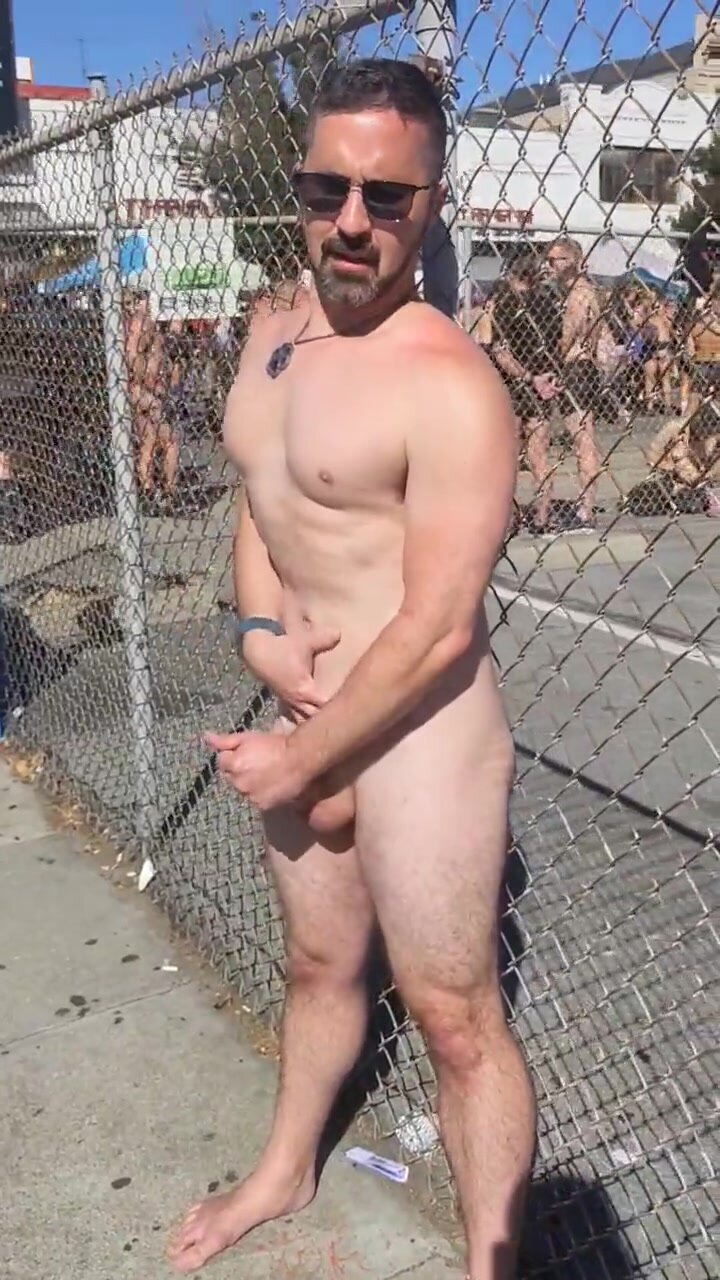 Exhibitionist jerks off  in front of  cheering people