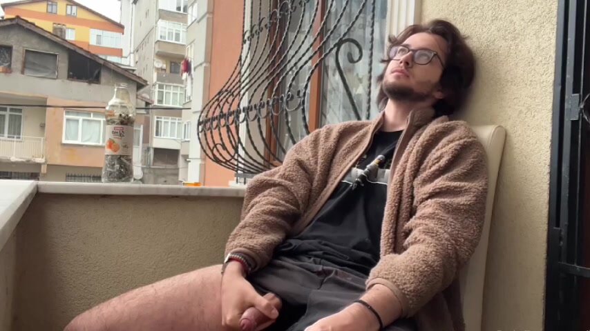 russian stud jerking off and smoking in balcony