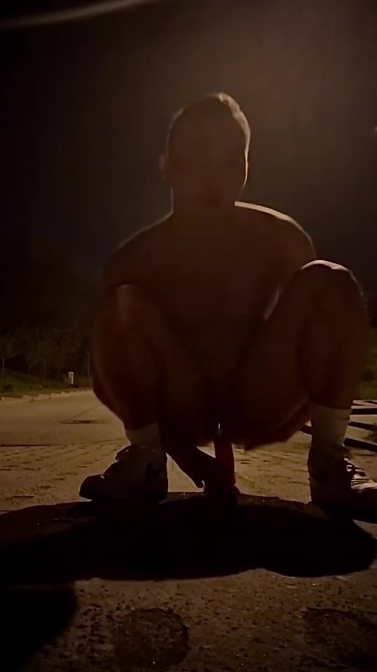 Riding a dildo in the middle of the street at night