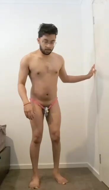 Chastity faggot uses a plug in his ass