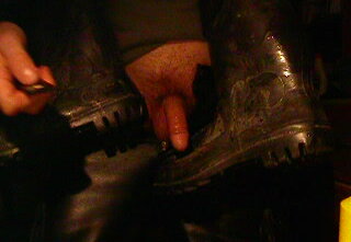 wanking between rubber boots