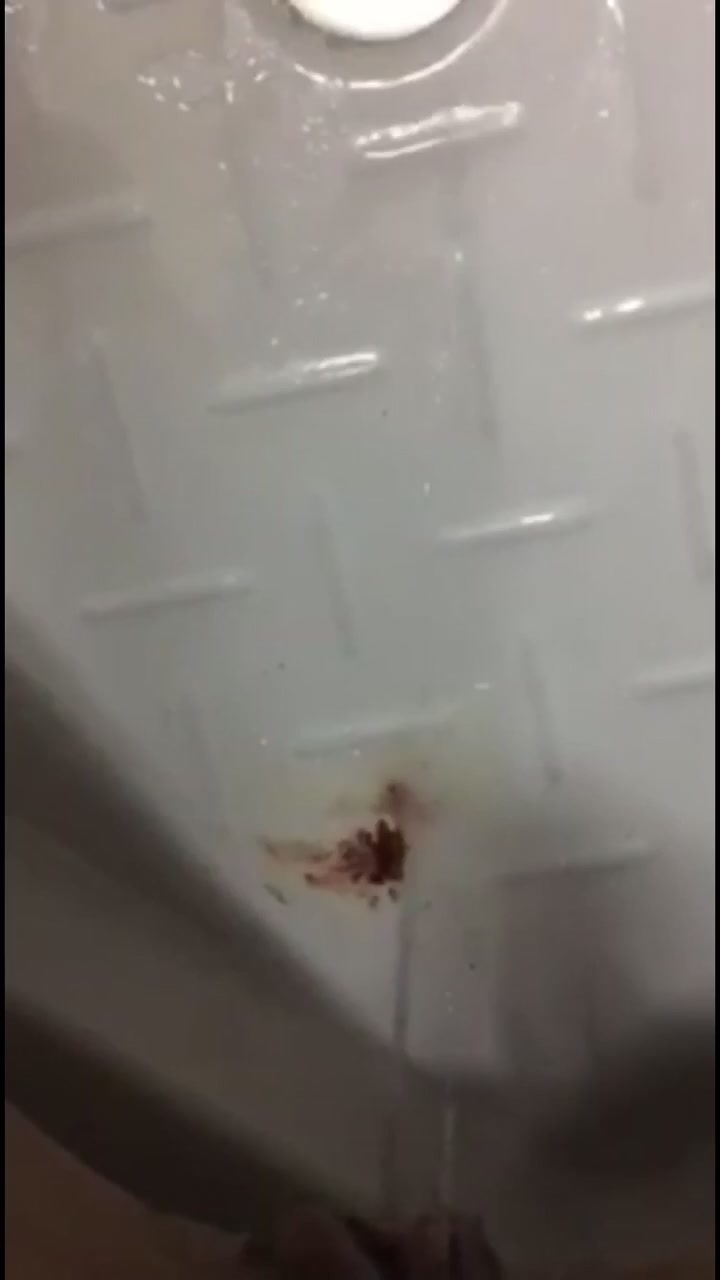 Peeing in Bathtub While in Her Period