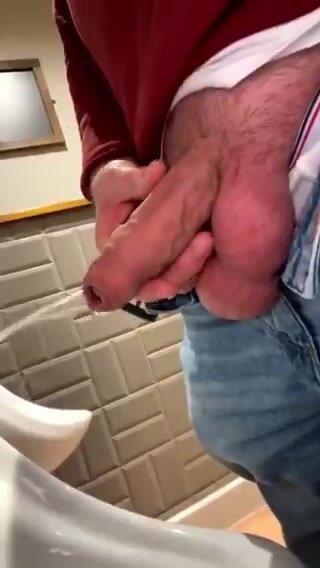 Big cock and balls at a urinal showing off