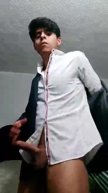 Hot suited guy stroking and cum