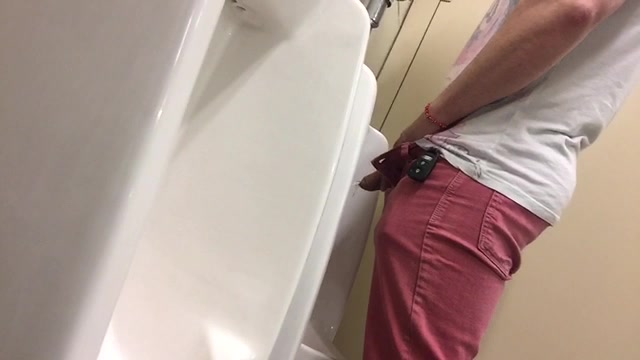 Muscular guy pissing - video 2