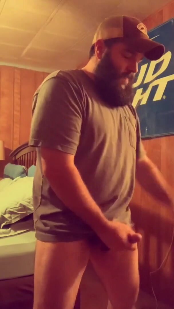 cigarette ballcap bushy beard wank in cabin