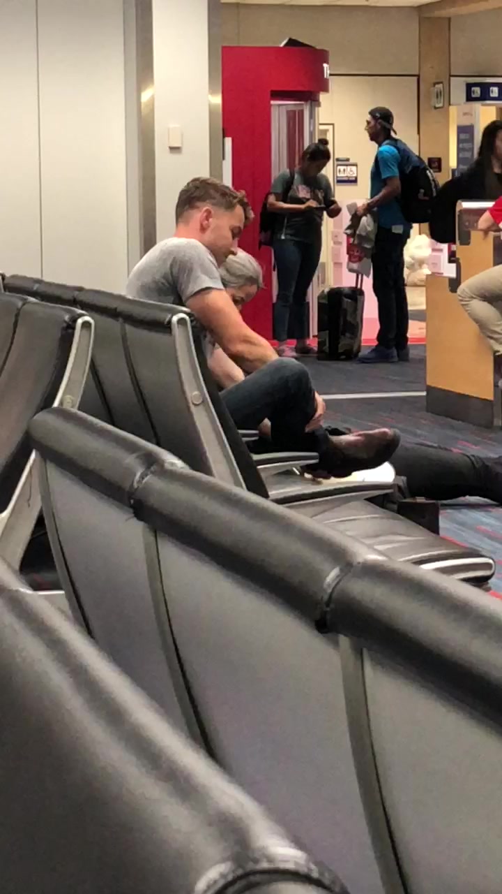 Cowboy Takes Off Boots and Socks in Airport - See’s me Looking
