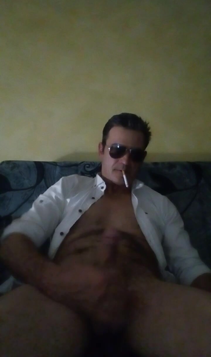 Mature man wanking and smoking