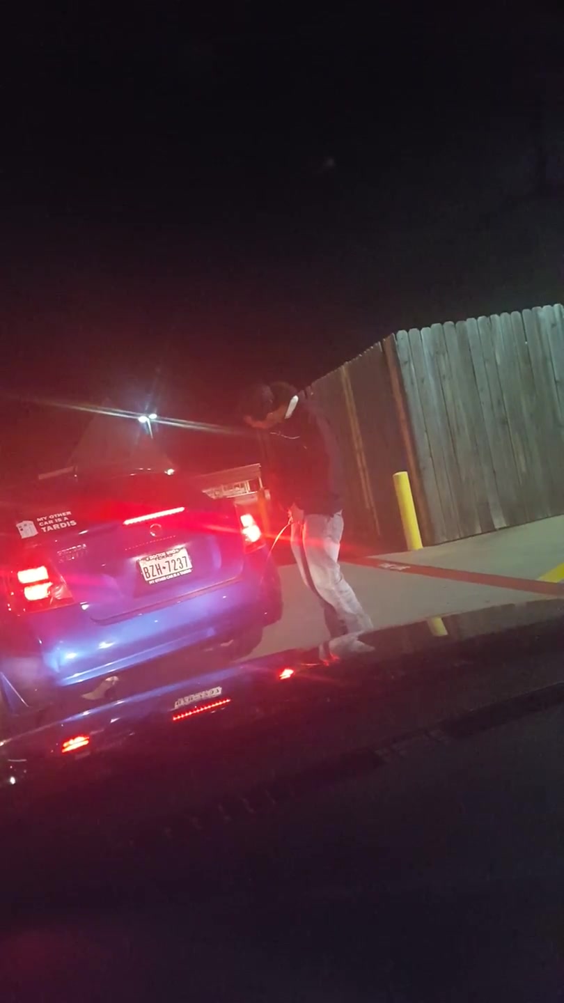 Guy pisses on car in drive thru