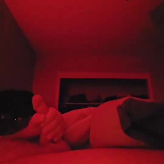 Stroking in red room