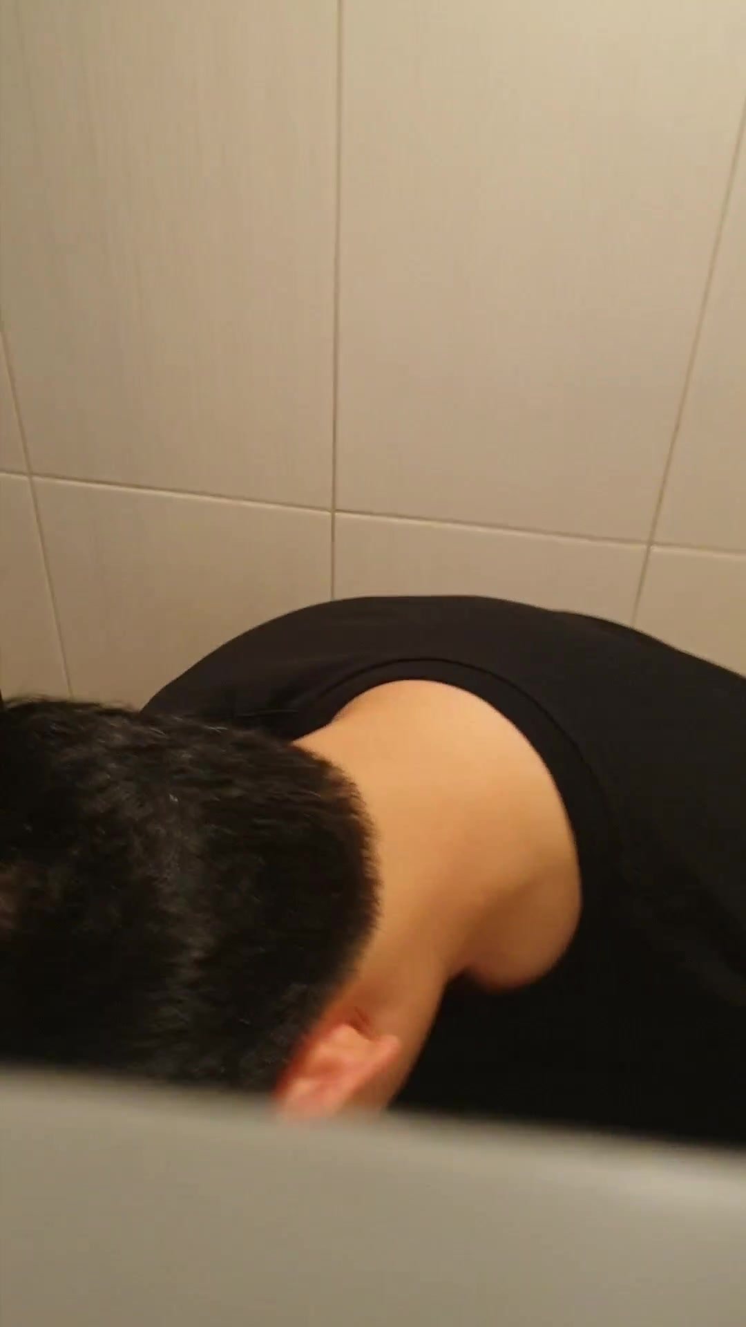 A boy wipes his ass