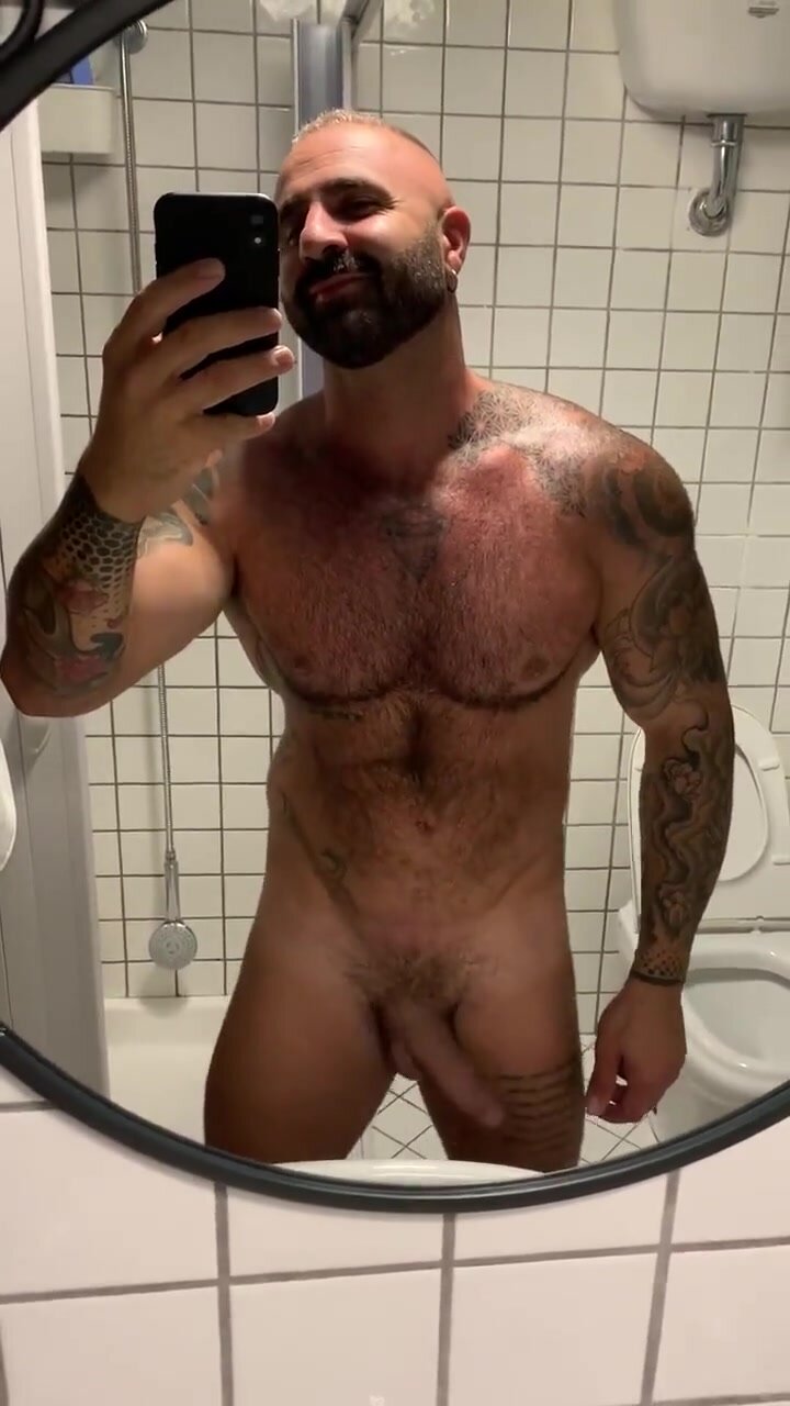 Hairy hunk shaking his monster dick