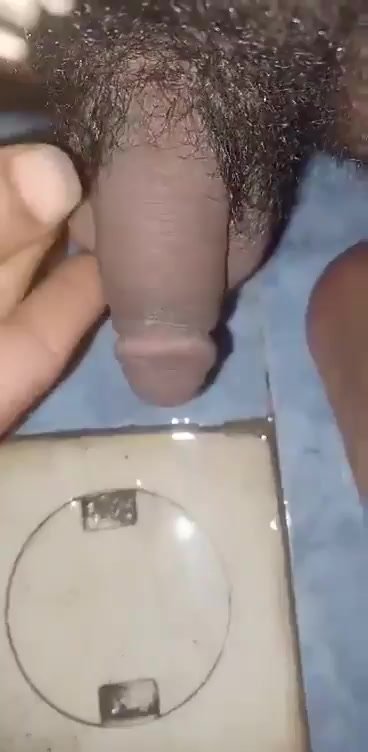 Yemeni man pees on bathroom floor next to squat toilet
