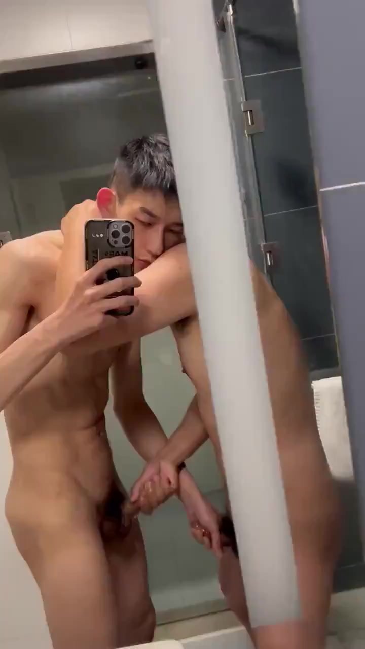 asian twins waking in a shower