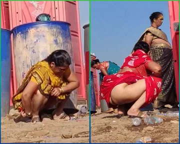 Women pissing together - ThisVid.com