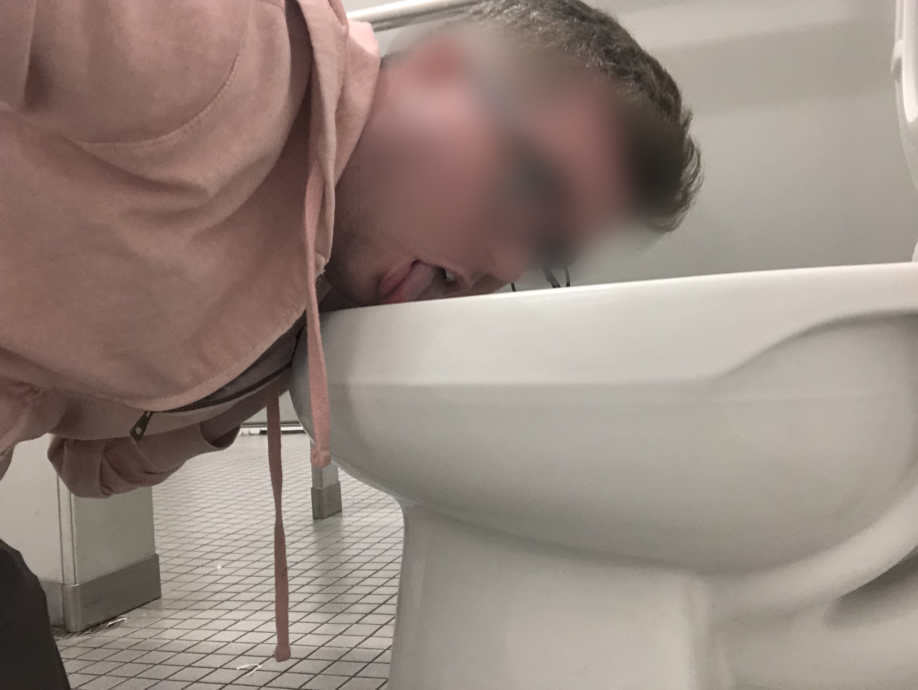 Fag licks a public urinal & toilet clean (again)